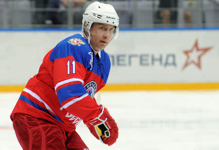 Russian President Vladimir Putin takes part in a gala game of the Night Ice Hockey League in Sochi, Russia, May 10, 2016. Mikhail Klimentyev/Sputnik/Kremlin via Reuters