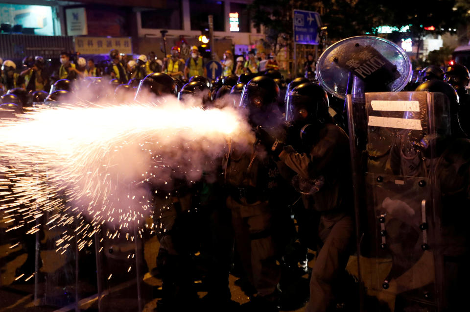 Riot police fire tear gas at anti-extradition demonstrators after a march to call for democratic reforms, in Hong Kong, China July 21, 2019. (Photo: Tyrone Siu/Reuters)