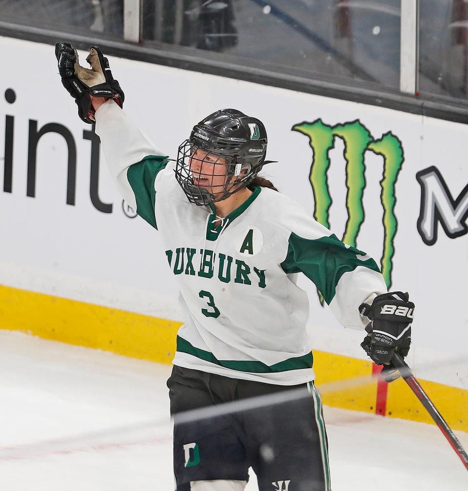 Duxbury Dragon #3 McKenna Colella celebrates a goal.The Duxbury High girls hockey team won the Division 2 state championship at TD Garden after defeating Canton on Sunday March 19, 2023 