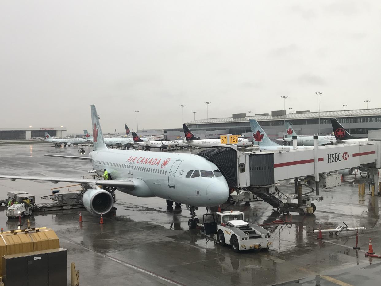 Air Canada jet at Toronto Pearson International Airport in Toronto, Canada, on May 3, 2018. (Photo by Daniel SLIM / AFP)        (Photo credit should read DANIEL SLIM/AFP/Getty Images)