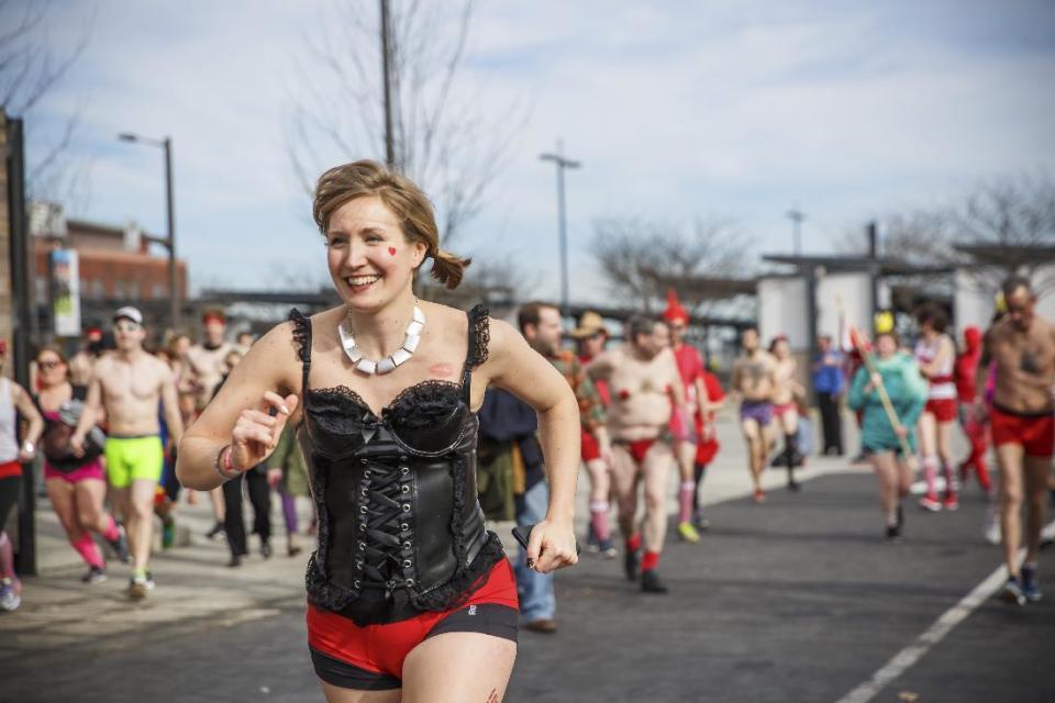 In this photo provided by Jamie Kassa, participants race in the annual Cupid's Undie Run, Saturday, Feb. 18, 2017, in Philadelphia. In briefs, boxers, bras and bloomers, participants ran three-quarters of a mile in the Valentine's Day-related charity event benefiting sick children. (Jamie Kassa via AP)