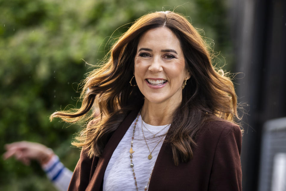 FILE - Denmark's Crown Princess Mary arrives to visit the Danish Hospital Clowns at the Child and Adolescent Psychiatric Center, Bispebjerg Hospital in Copenhagen, Thursday Oct. 5, 2023. Thousands of people will gather in downtown Copenhagen on Sunday, Jan. 14, 2024 to witness a historic moment in one of the world’s oldest monarchies. Around 2 p.m. Queen Margrethe II will sign her abdication and about an hour later her eldest son will be proclaimed as King Frederik X on the balcony of Christiansborg Palace in the heart of the Danish capital. (Ida Marie Odgaard/Ritzau Scanpix via AP, File)