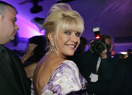 FILE PHOTO: Ivana Trump smiles at her belated birthday party at the Pangaea Soleil club during the 59th Cannes Film Festival in Cannes May 24, 2006.