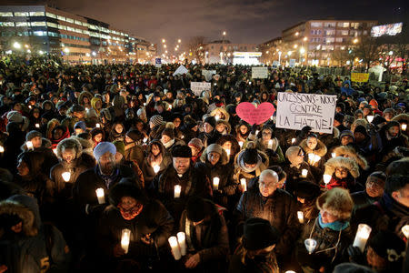 People attend a vigil in support of the Muslim community in Montreal, Quebec, January 30, 2017. REUTERS/Dario Ayala