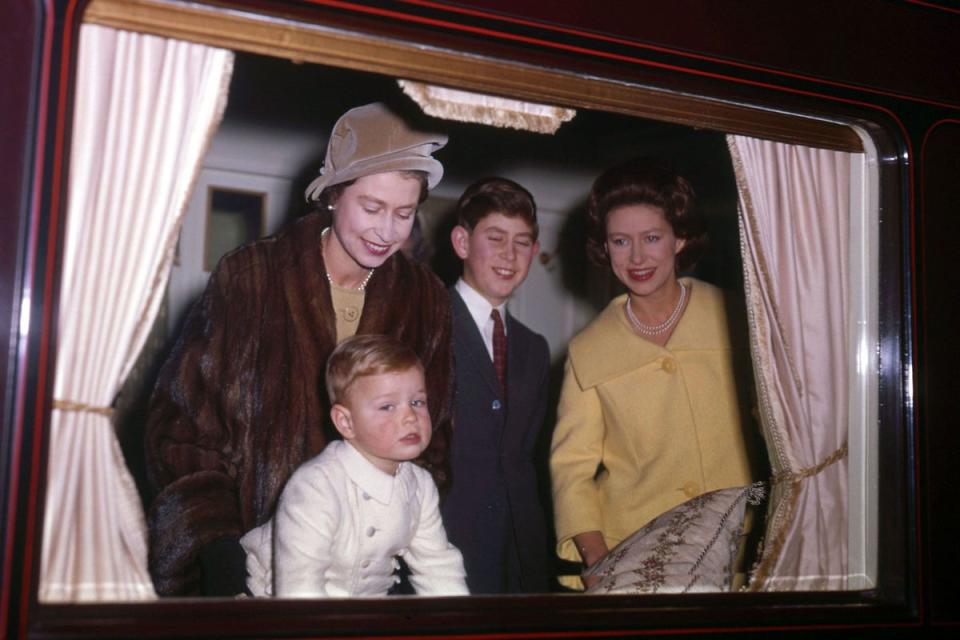 In training: Queen Elizabeth with Princess Margaret, Prince Charles and Prince Andrew in the royal train en route for Christmas at Sandringham (Reginald Davis/REX)