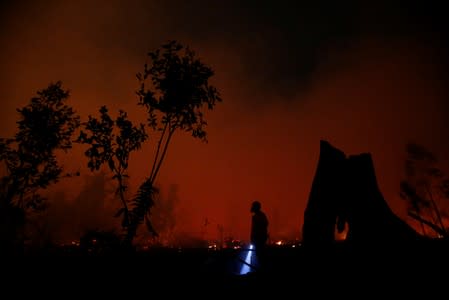 The Wider Image: Indonesia's firefighters on frontline of Borneo's forest blazes