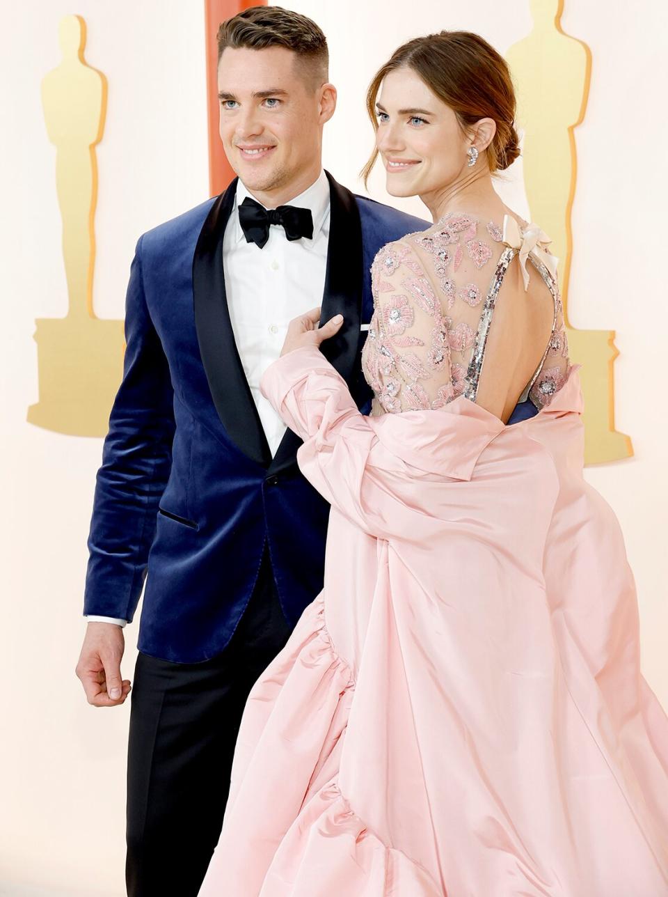 Alexander Dreymon and Allison Williams attend the 95th Annual Academy Awards on March 12, 2023 in Hollywood, California.