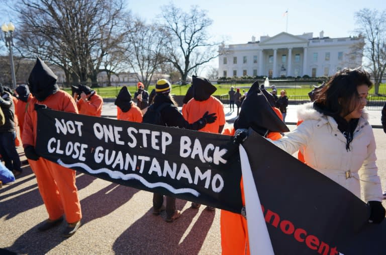 Demonstrators take part in a protest calling for the closure of the Guantanamo Bay prison on January 11, 2016 in front of the White House