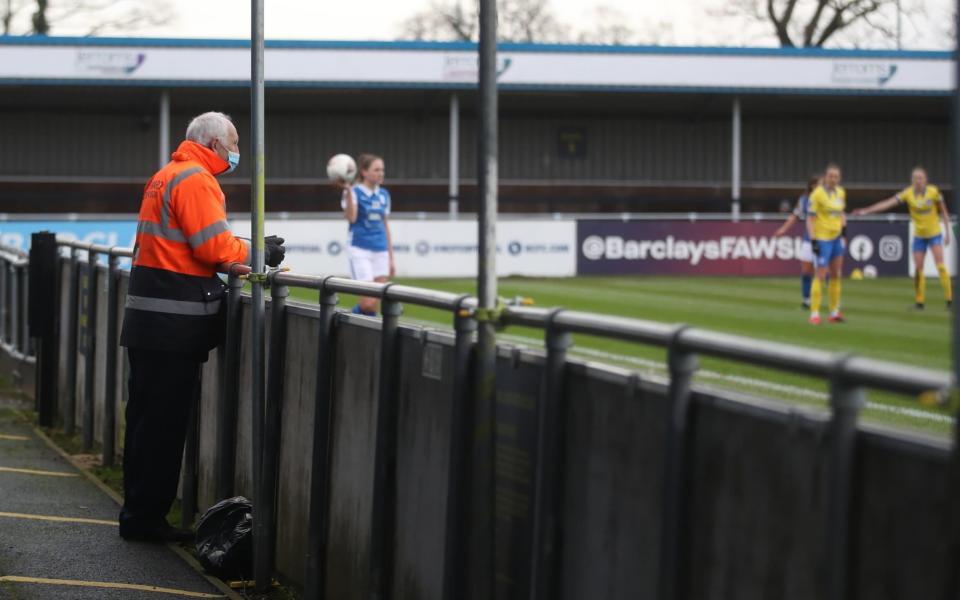 Soccer Football - Women's Super League - Birmingham City v Brighton & Hove Albion - Damson Park, Solihull, Britain - January 17, 2021 General view as a steward looks on during the match - Action Images via Reuters /CARL RECINE 