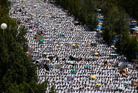 Muslim pilgrims pray outside Namira Mosque on the plains of Arafat during the annual haj pilgrimage, outside the holy city of Mecca, Saudi Arabia August 20, 2018. REUTERS/Zohra Bensemra