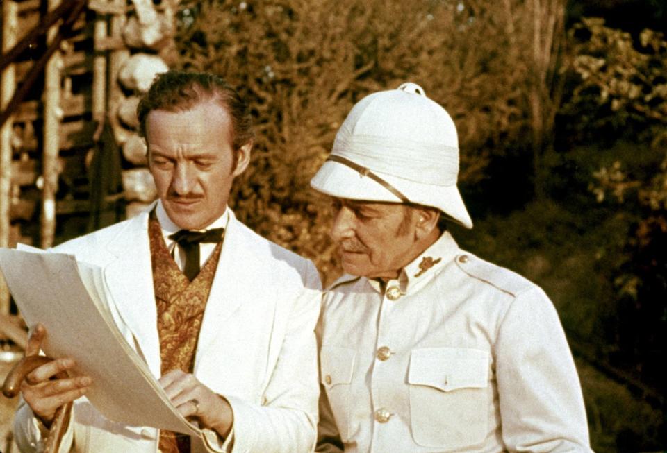 Phileas Fogg (David Niven, left, with Robert Newton) circumnavigates the globe on a bet in "Around the World in 80 Days."