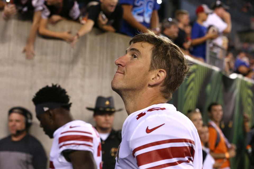 Aug 22, 2019; Cincinnati, OH, USA; New York Giants quarterback Eli Manning (10) looks up while on his way to the lockerroom for halftime against the Cincinnati Bengals at Paul Brown Stadium. Mandatory Credit: Bob Meyer-USA TODAY Sports