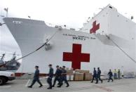 San Diego-based hospital ship USNS Mercy prepares for possible deployment to aid the typhoon-stricken areas of the Philippines from its port in San Diego, California November 15, 2013. REUTERS/Mike Blake