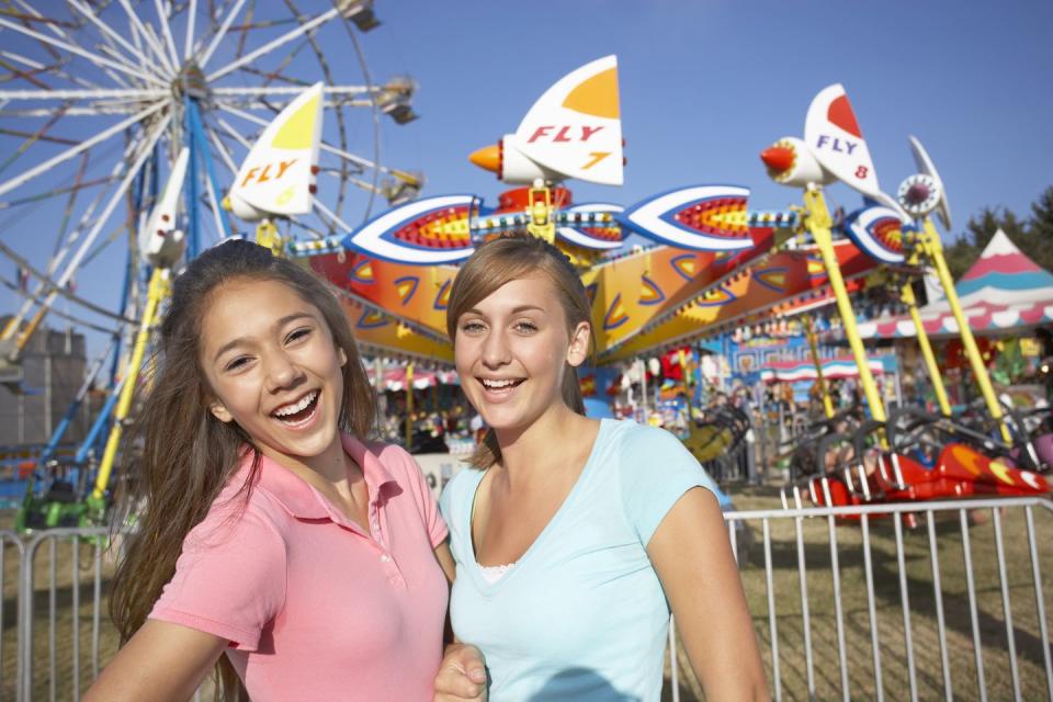 smiling girls at fair 4th of july activities