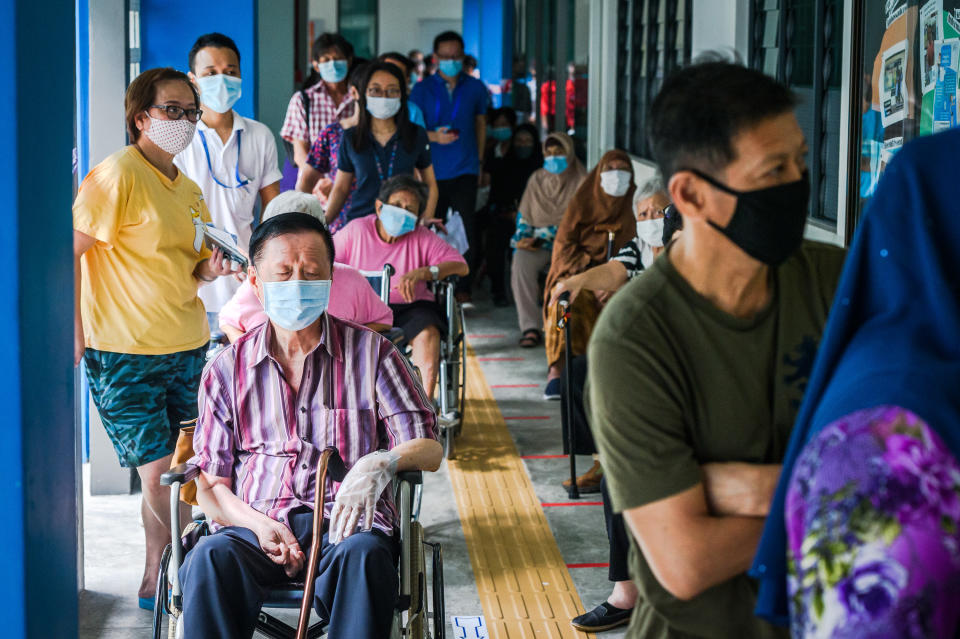 People queueing to vote at the Dunearn Secondary School polling centre on 10 July. (PHOTO: Joseph Nair for Yahoo News Singapore)