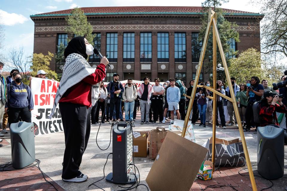 U-M students chant "Occupation No More" and "Israel Is a Terrorist State" as they rally during the encampment for Gaza at the Diag in Ann Arbor on Monday, April 22, 2024.