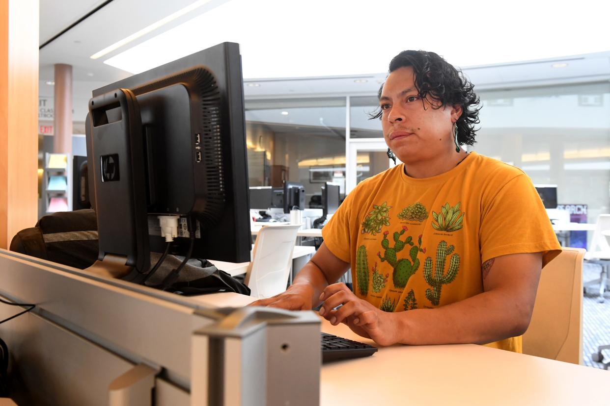 Sergio Solis, of Oxnard, logs in to a computer in the Library Resources Center at Oxnard College on Sept. 26. Solis is studying anthropology with plans to transfer to a University of California campus.