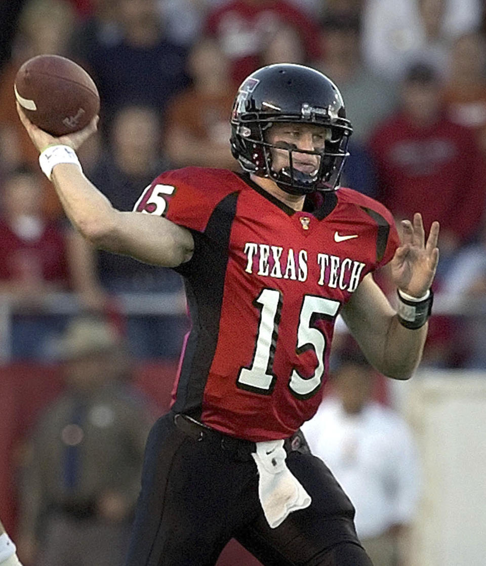 FILE - Texas Tech quarterback Sonny Cumbie passes in the first quarter in Lubbock, Texas, in this Saturday, Oct. 23, 2004, file photo. Cumbie is on pace to become the third straight Texas Tech quarterback to lead the nation in passing, a statistic that leads some to question whether he's just another product of coach Mike Leach's wide-open offense. Four former Big 12 quarterbacks are coaching QBs at their alma mater, with three new in those roles this spring. Collin Klein, the 2012 Heisman Trophy finalist at Kansas State, is going into his fifth season as the Wildcats quarterback coach. The new trio are Sonny Cumbie at Texas Tech, Kenny Hill at TCU and Shawn Bell at Baylor. (AP Photo/L.M. Otero, File)