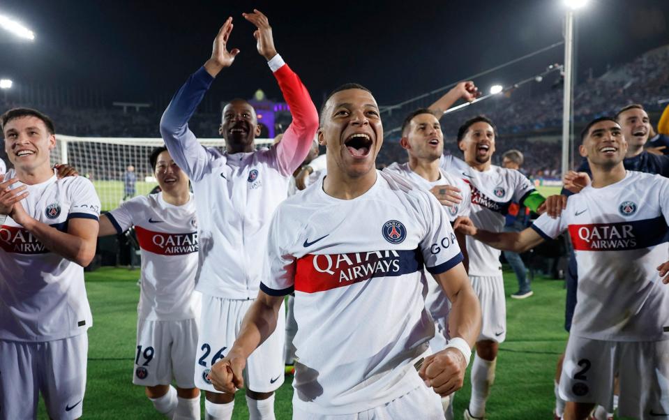 Quarter Final - Second Leg - FC Barcelona v Paris St Germain - Estadi Olimpic Lluis Companys, Barcelona, Spain - April 16, 2024 Paris St Germain's Kylian Mbappe with teammates celebrate