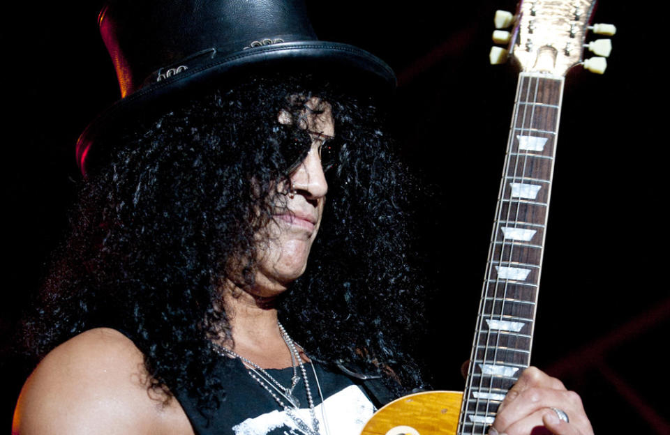 Slash's go-to guitar is the Les Paul after seeing Jimmy Page and Eric Clapton playing the guitar credit:Bang Showbiz