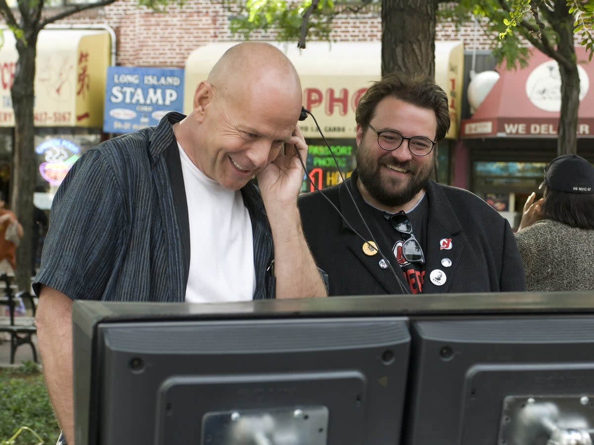 Bruce Willis and Kevin Smith are all smiles on the set of ‘Cop Out' (Warner Bros/Kobal/Shutterstock)
