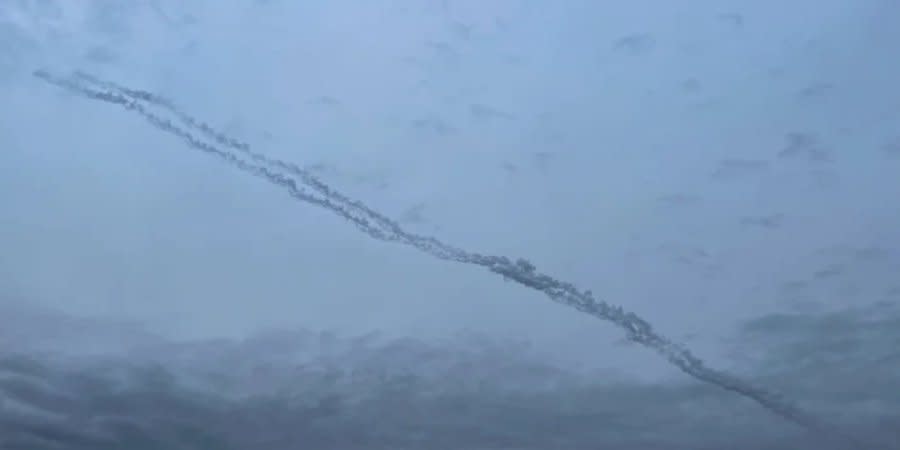 Traces of missiles visible in the sky