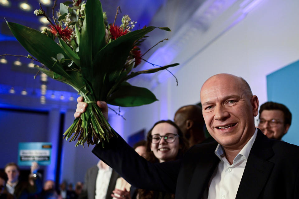 The top candidate of the Christian Democratic Union party (CDU), Kai Wegner, celebrates after the state elections in Berlin, Germany, Sunday, Feb. 12, 2023. The city of Berlin on Sunday, Feb. 12, 2023, holds a court-ordered rerun of a chaotic 2021 state election that was marred by severe glitches at many polling stations. (Fabian Sommer/dpa via AP)