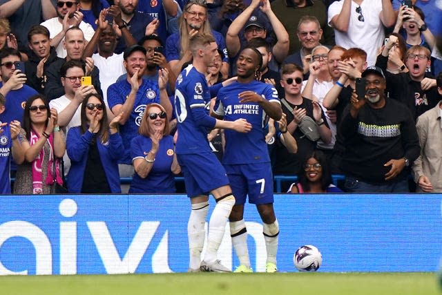 Raheem Sterling (right) celebrates scoring the second Chelsea goal