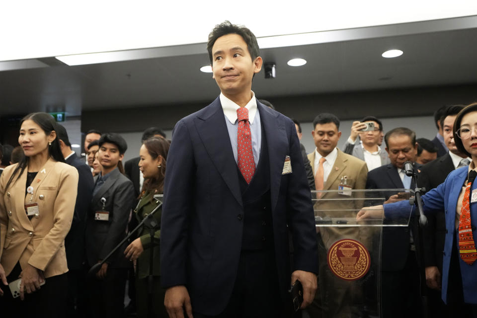 Former leader of Move Forward party Pita Limjaroenrat leaves after a news conference at parliament in Bangkok, Thailand, Wednesday, Jan. 31, 2024. Thailand’s Constitutional Court ruled Wednesday that the progressive Move Forward party must cease advocating amending the law on royal defamation — a decision that leaves the party vulnerable to further complaints and even dissolution. (AP Photo/Sakchai Lalit)