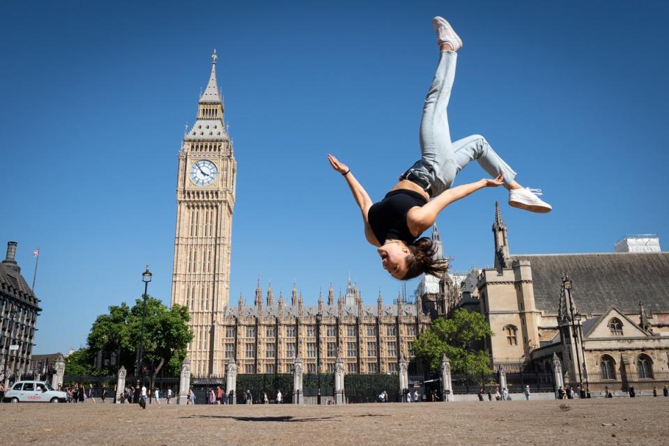 Trampolinist Nicole Steiner from Switzerland practices some moves on a dried out Parliament Square (Stefan Rousseau/PA) (PA Wire)