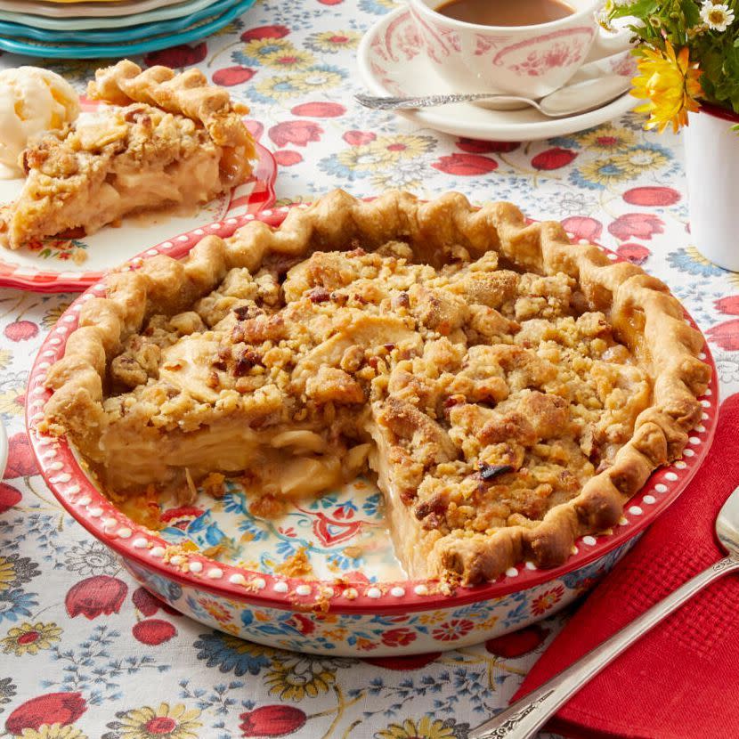 <p>Rich and decadent, this apple pie recipe features a crumbly topping of butter, flour, sugar, and pecans. The result is a bubbly, golden brown beauty that's best served with Ree's boozy "<a href="https://www.thepioneerwoman.com/food-cooking/recipes/a9554/hard-sauce/" rel="nofollow noopener" target="_blank" data-ylk="slk:Hard Sauce;elm:context_link;itc:0;sec:content-canvas" class="link ">Hard Sauce</a>."</p><p><strong><a href="https://www.thepioneerwoman.com/food-cooking/recipes/a9553/dreamy-apple-pie/" rel="nofollow noopener" target="_blank" data-ylk="slk:Get the recipe.;elm:context_link;itc:0;sec:content-canvas" class="link ">Get the recipe.</a></strong></p>