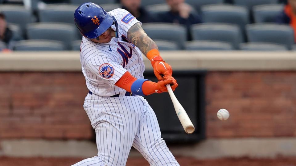 New York Mets catcher Francisco Alvarez (4) hits a two run double against the Atlanta Braves during the sixth inning at Citi Field