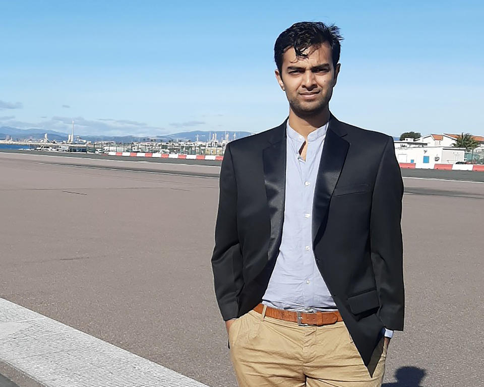 Handout photo taken in January 2020 of Dr. Nishant Joshi at the airport in Gibraltar. The 31-year-old emergency medicine specialist is on the frontlines of the coronavirus pandemic and he's angry. Joshi believes he risks his life every time he walks into a hospital because U.K. doctors and nurses haven't been equipped with the kind of personal protection equipment they need to prevent them from being infected with COVID-19. Britain's National Health Service, cornerstone of the nation's post-war welfare state, may be stretched to the breaking point in coming weeks as hospitals brace for an expected tsunami of critically ill patients when the coronavirus pandemic reaches its peak across the United Kingdom. (Nishant Joshi via AP)