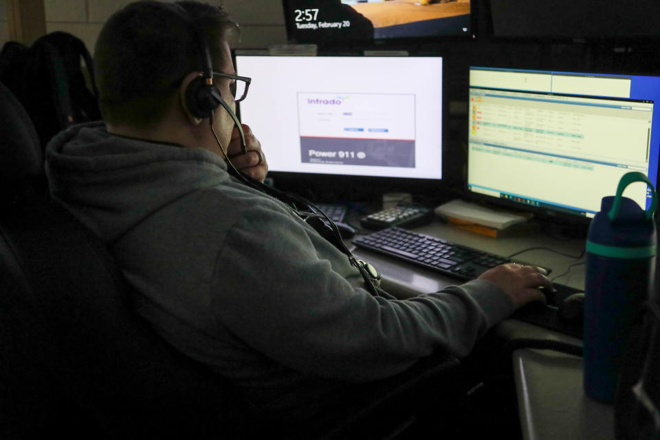 A 911 dispatcher works at the Chatham County 911 Center on Tuesday, February 20, 2024.