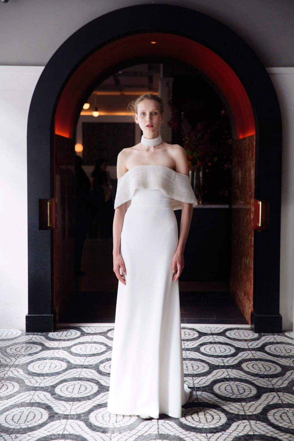 Off-the-shoulder gown featuring pearl details from the Lela Rose Spring 2018 bridal collection