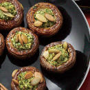 <p>These pesto-filled, two-bite cremini mushrooms are perfect as an appetizer or as a side to grilled chicken or steak. The spicy Mexican-inspired pesto combines parsley, cilantro, pepitas, crushed red pepper and Cojita cheese for an innovative take on the traditional Italian recipe.</p><p><a rel="nofollow noopener" href="http://www.myrecipes.com/recipe/pepita-pesto-stuffed-mushrooms" target="_blank" data-ylk="slk:View Recipe: Pepita Pesto-Stuffed Mushrooms;elm:context_link;itc:0;sec:content-canvas" class="link ">View Recipe: Pepita Pesto-Stuffed Mushrooms</a></p>