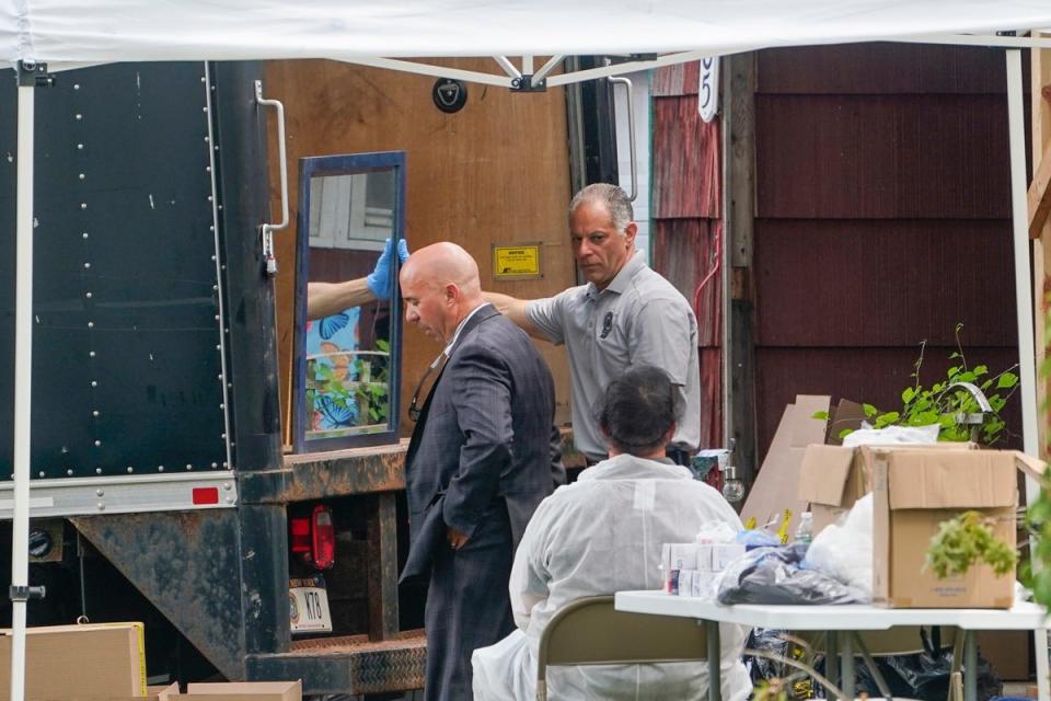 Authorities search the home of suspect Rex Heuermann, Tuesday, July 18, 2023, in Massapequa Park (Copyright 2023 The Associated Press. All rights reserved.)