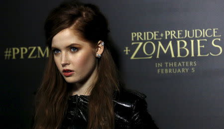 Cast member Ellie Bamber poses at the premiere of "Pride and Prejudice and Zombies" in Los Angeles, California January 21, 2016. REUTERS/Mario Anzuoni