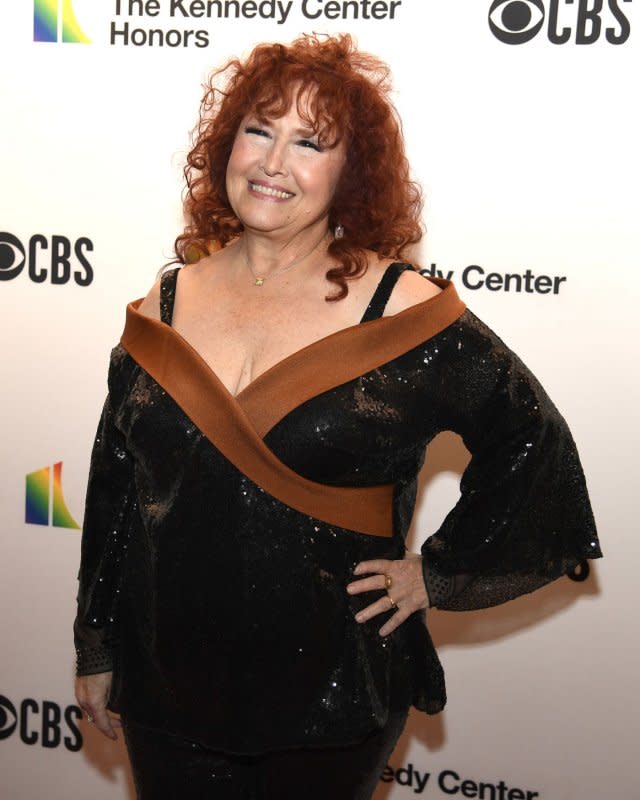 Melissa Manchester poses for photographers as she arrives for the Kennedy Center Honors gala evening in Washington, D.C., on December 5, 2021. The singer turns 73 on February 15. File Photo by Mike Theiler/UPI
