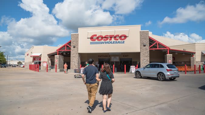 couple walking into Costco