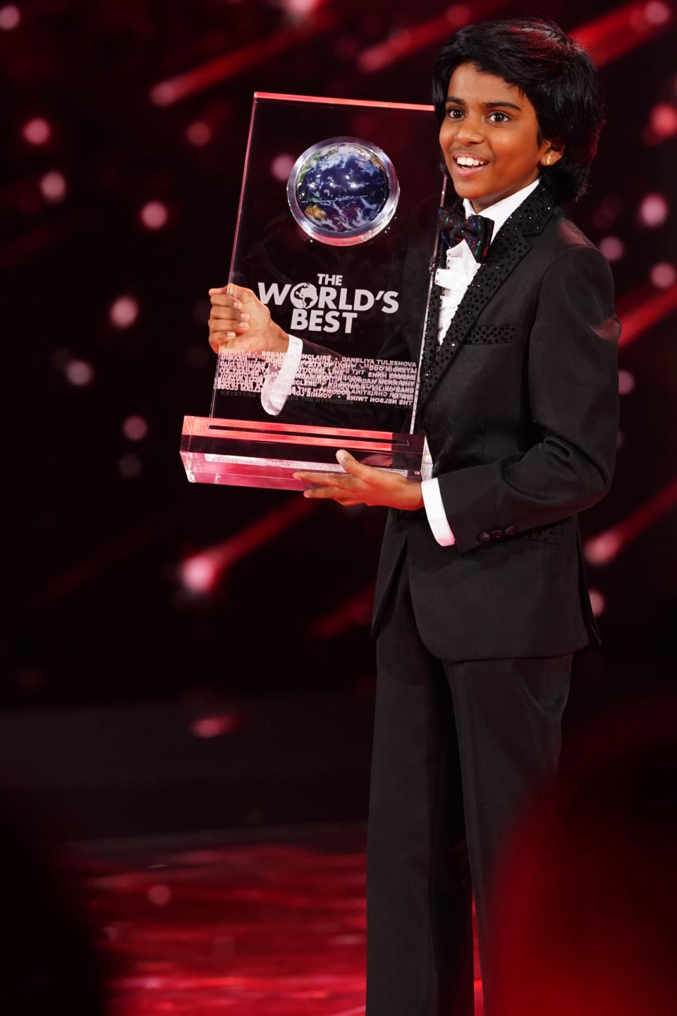 Lydian Nadhaswaram with his "The World's Best" winner trophy