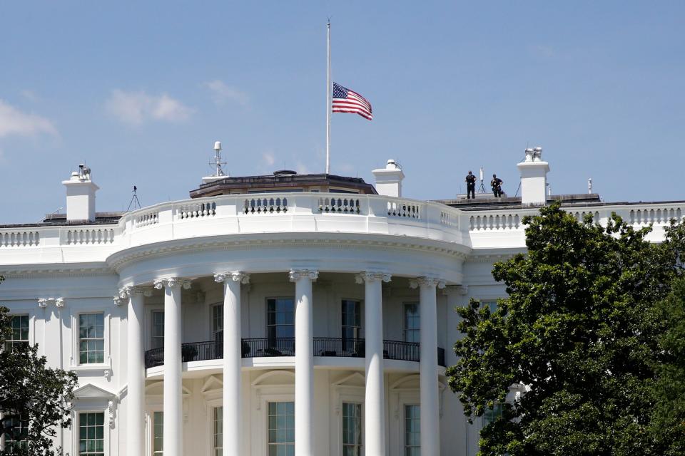 An American flag flies at half-staff over the White House on Saturday, in remembrance of Rep. John Lewis, D-Ga. Lewis, who carried the struggle against racial discrimination from Southern battlegrounds of the 1960s to the halls of Congress, died Friday.