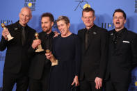 75th Golden Globe Awards – Photo Room – Beverly Hills, California, U.S., 07/01/2018 – Martin McDonagh (L) poses backstage with cast and producers of "Three Billboards Outside Ebbing, Missouri" after winning for Best Motion Picture - Drama. REUTERS/Lucy Nicholson/Files