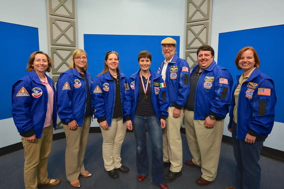Members of the Space Camp Hall of Fame welcome European Space Agency (ESA) astronaut Samantha Cristoforetti into their ranks. From left to right: Liz Warren (2012), Andrea Hanson (2010), Amanda Stubblefield (2007), Samantha, Jim Allan and Rober