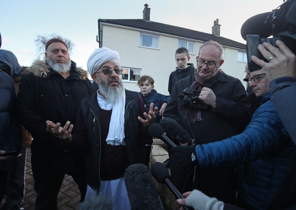 Imam Mohammed Amin Pandor speaking to the media outside Almondbury Community School (PA)