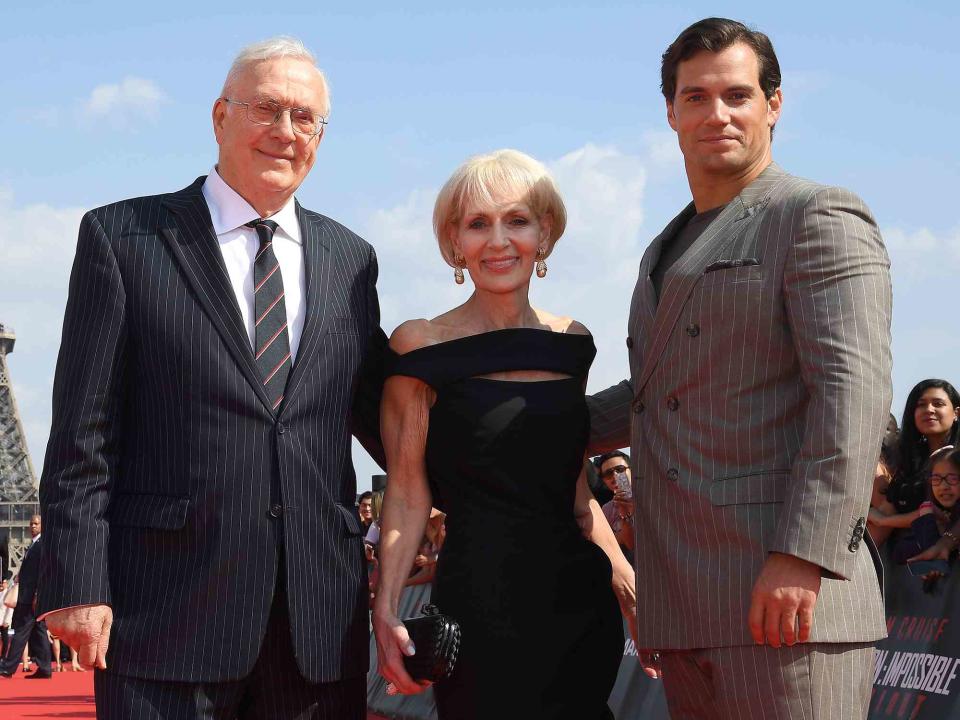 <p>Pascal Le Segretain/Getty</p> Henry Cavill and his parents Marianne and Colin Cavill attend the global premiere of 
