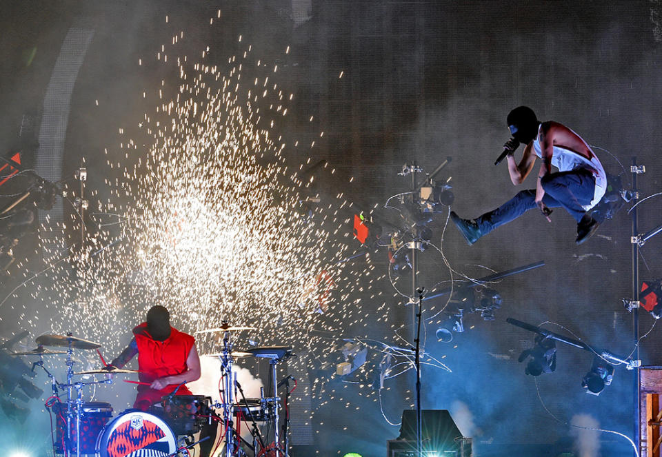 Josh Dun (L) and Tyler Joseph of Twenty One Pilots perform onstage during the 2016 American Music Awards at Microsoft Theater on November 20, 2016 in Los Angeles, California. (Photo by Kevin Winter/Getty Images)