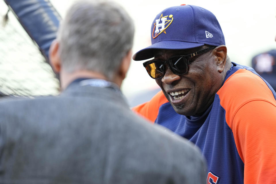 Houston Astros manager Dusty Baker Jr. right, speaks with former MLB player Craig Biggio ahead of Game 2 of baseball's American League Championship Series between the Houston Astros and the New York Yankees, Thursday, Oct. 20, 2022, in Houston. (AP Photo/Kevin M. Cox)