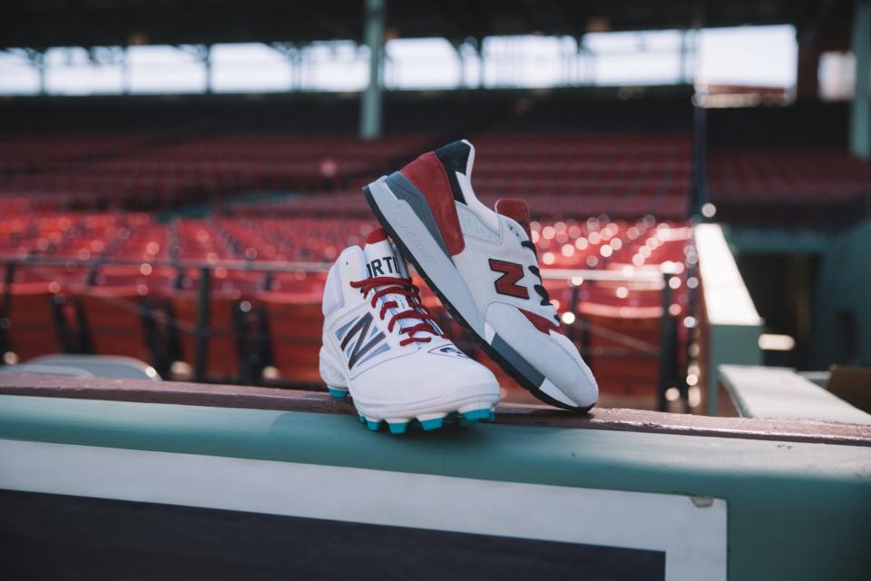 The Boston cleats and sneakers shown in Fenway Park. (New Balance)