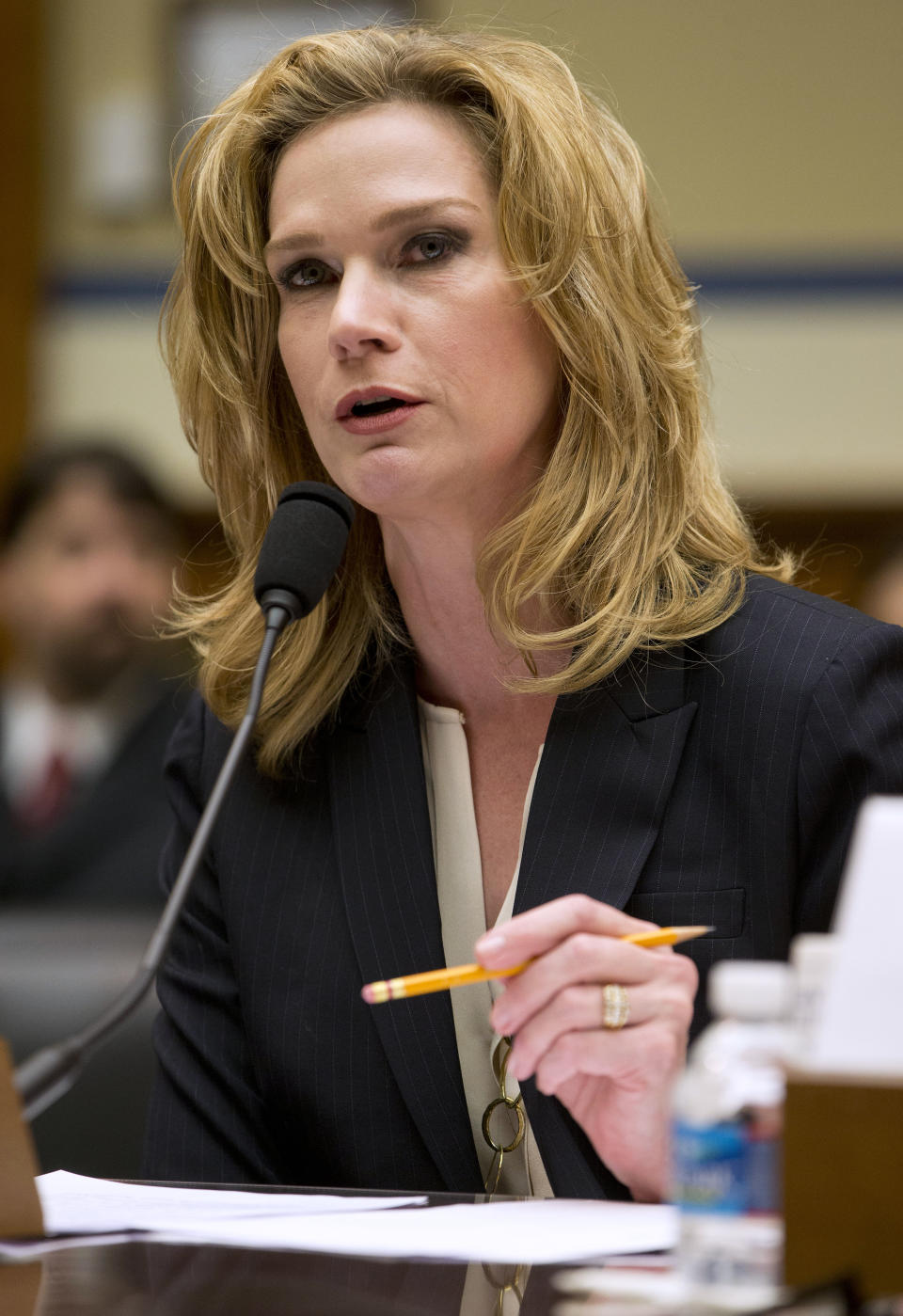 FILE - Catherine Engelbrecht, founder of King Street Patriots and True the Vote, testifies on Capitol Hill, Feb. 6, 2014, in Washington. A lawsuit that plaintiffs say could deter mass voter challenges around the country ahead of the 2024 election is headed to trial in Georgia on Thursday, Oct. 26, 2023. A group associated with Democrat Stacey Abrams accuses Texas-based True the Vote of trying to intimidate voters ahead of a 2021 Senate runoff election in Georgia. (AP Photo/Pablo Martinez Monsivais, File)